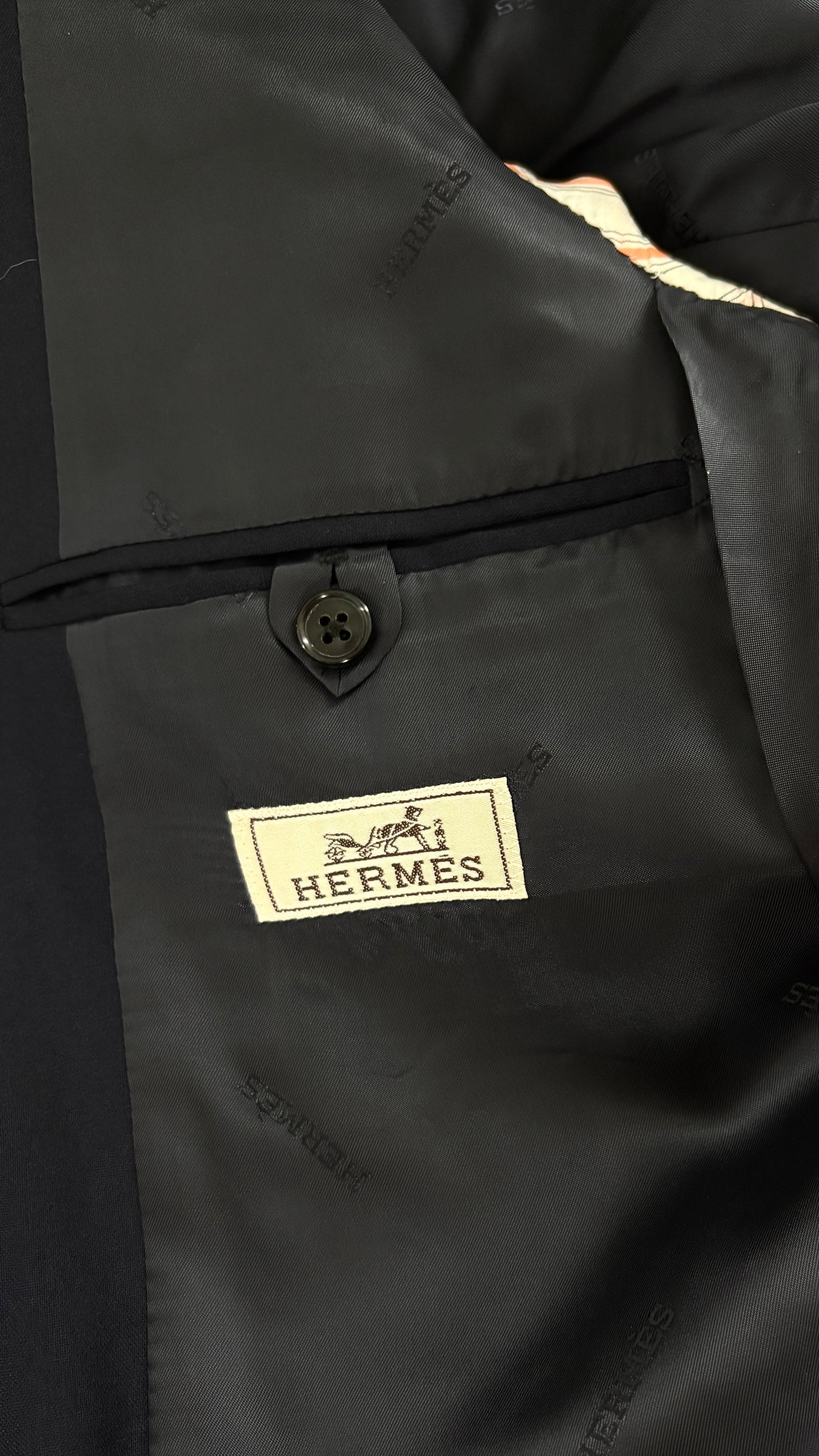 Hermés tailored jacket with embossed buttons