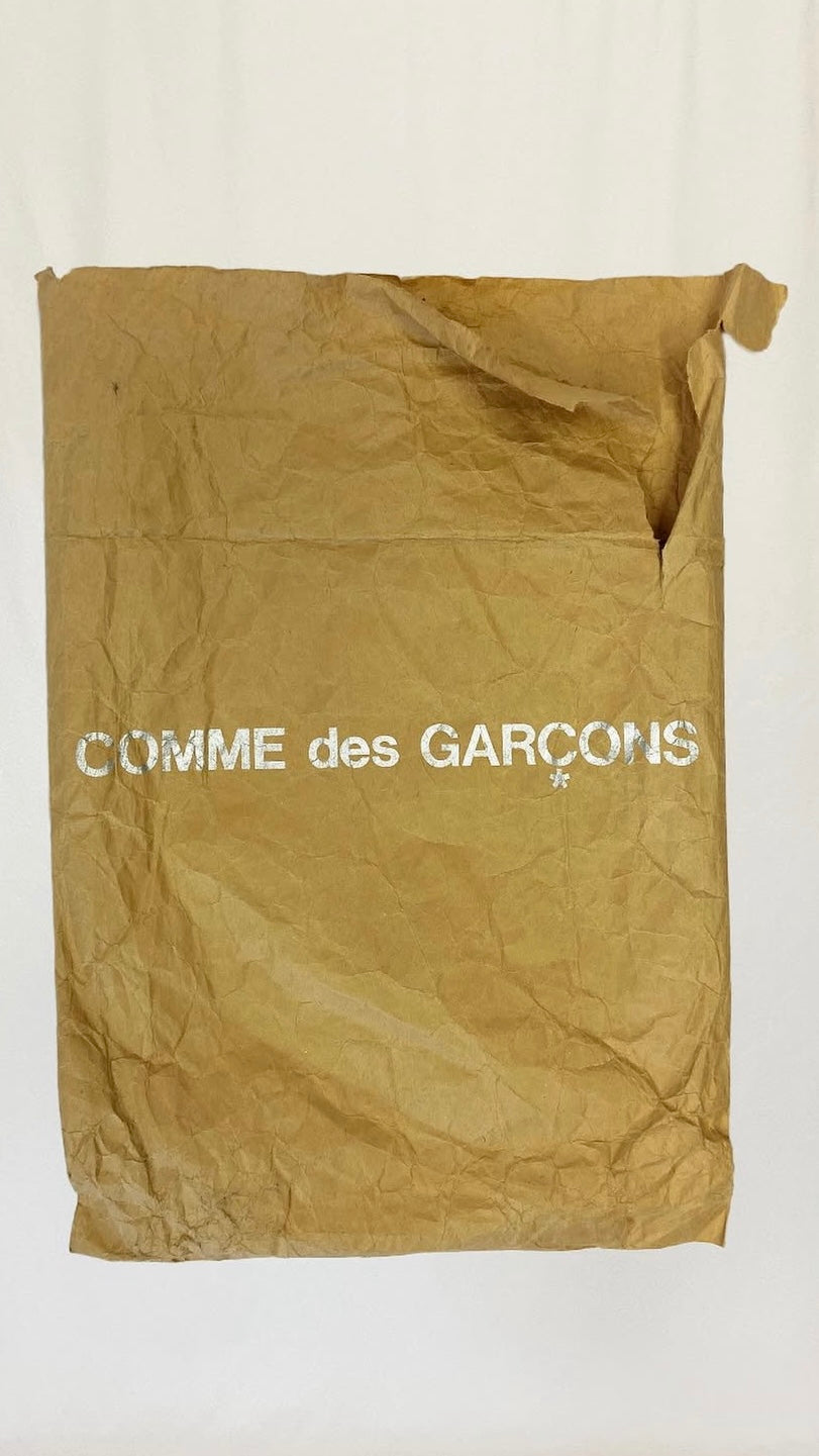 Comme des Garcons S/S 1997 'Body meets dress' paper skirt with envelope