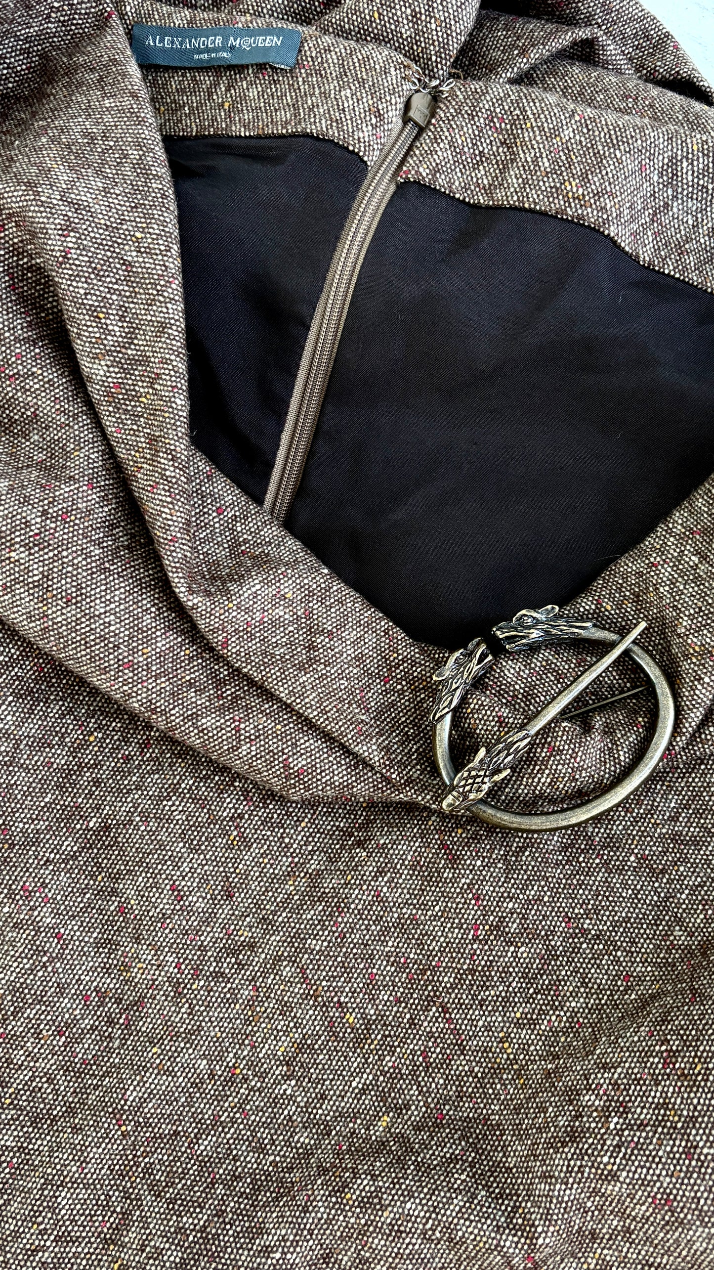 Alexander McQueen A/W 2006 draped tweed dress with wolf broach