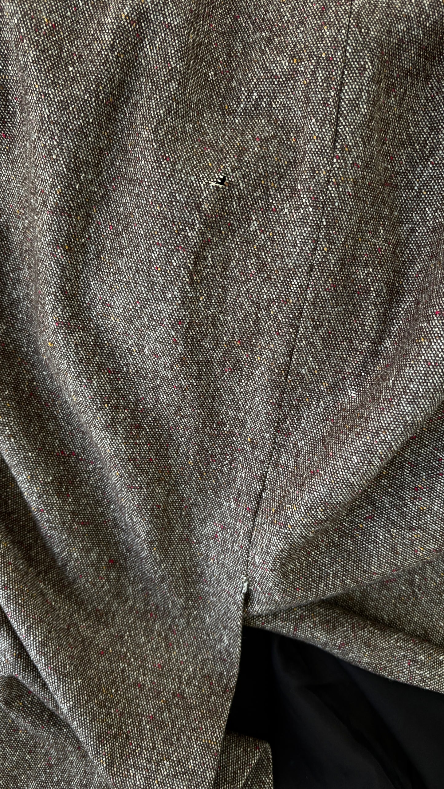 Alexander McQueen A/W 2006 draped tweed dress with wolf broach
