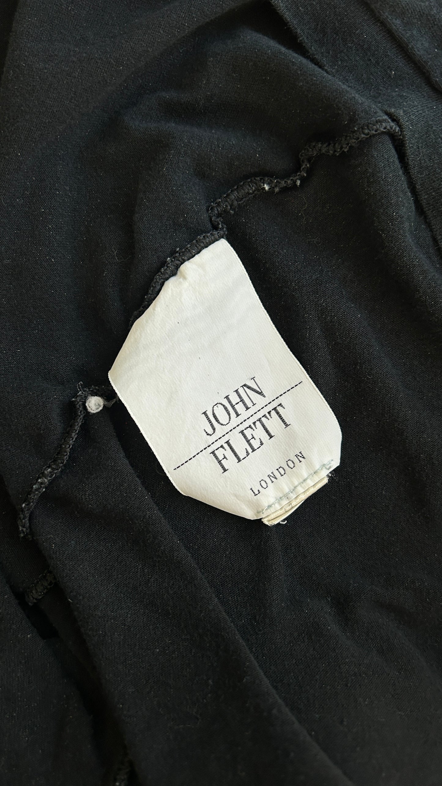 John Flett jersey top with circle cut shoulder