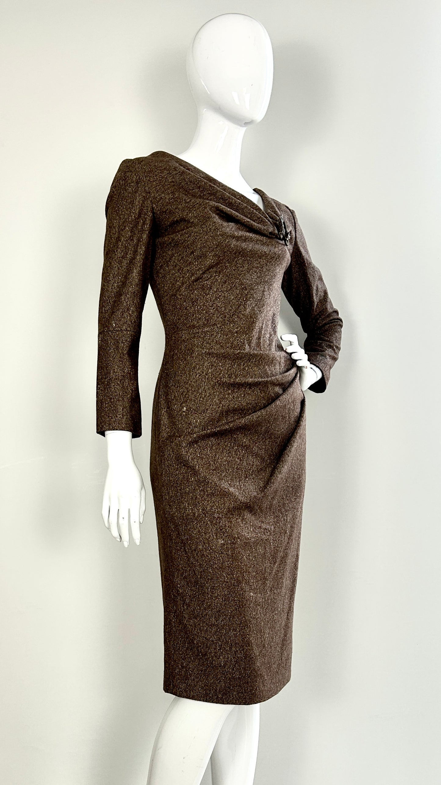Alexander McQueen A/W 2006 draped tweed dress with wolf broach