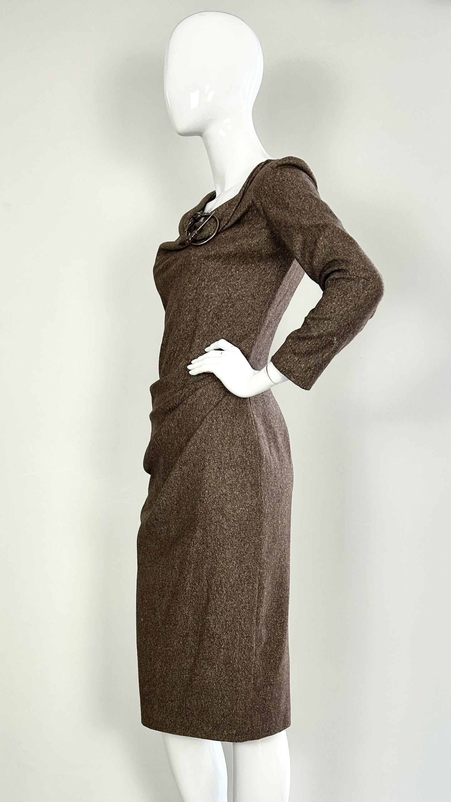 Alexander McQueen A/W 2006 draped tweed dress with wolf broach