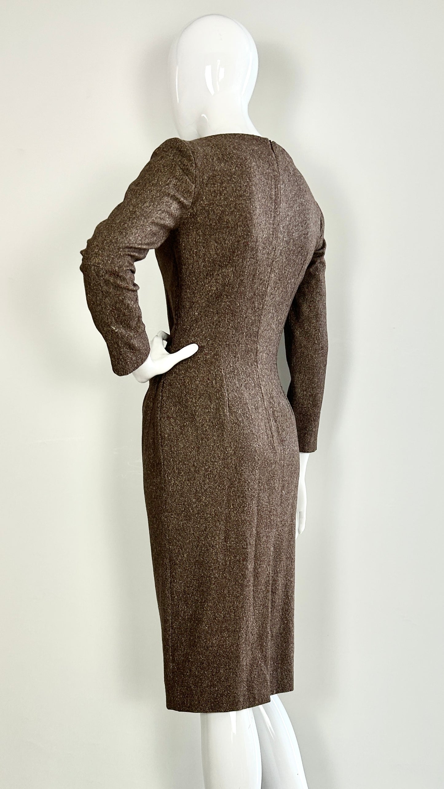 Alexander McQueen A/W 2006 draped tweed dress with wolf broach