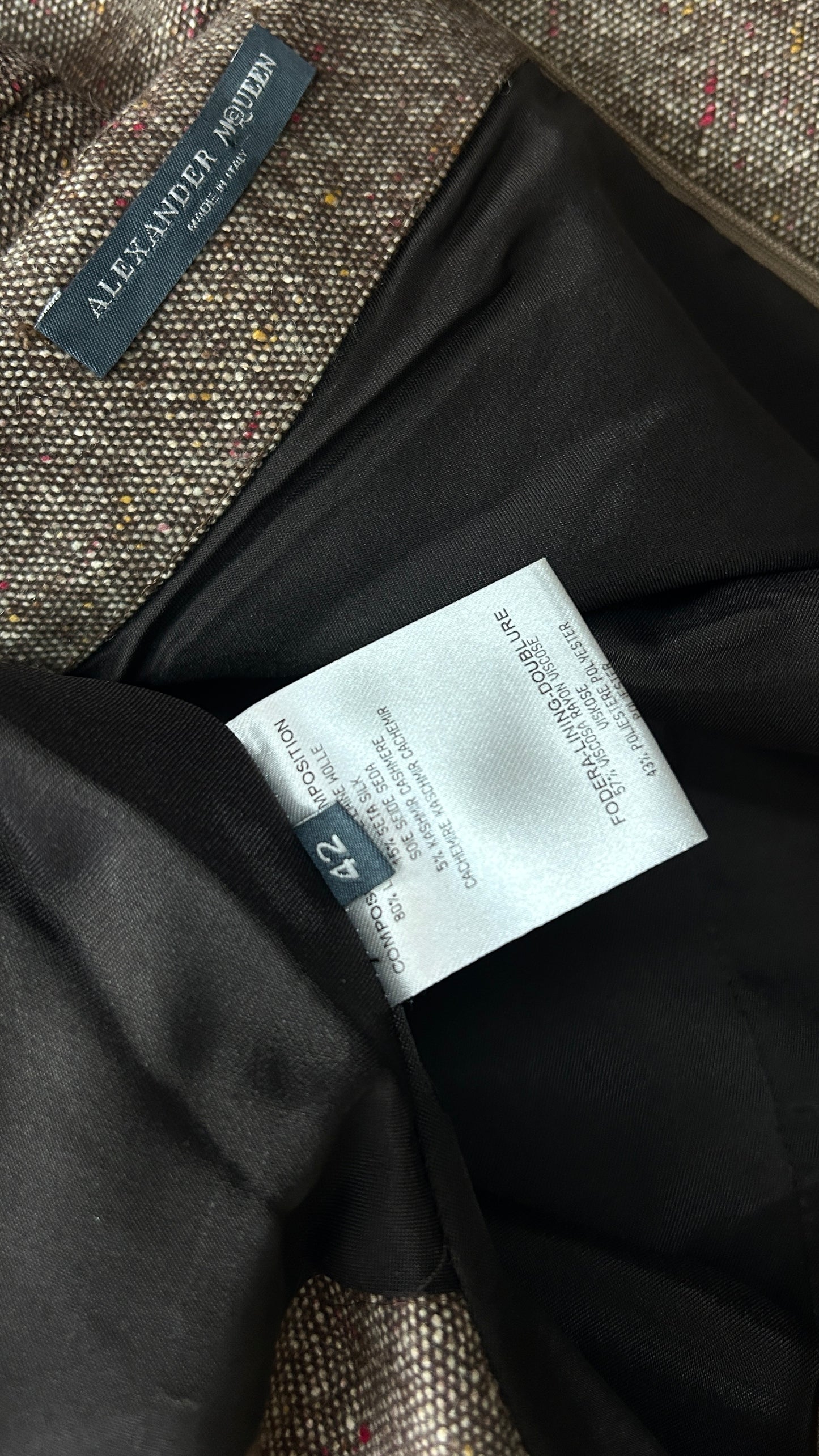 Alexander McQueen A/W 2006 draped tweed dress with wolf broach