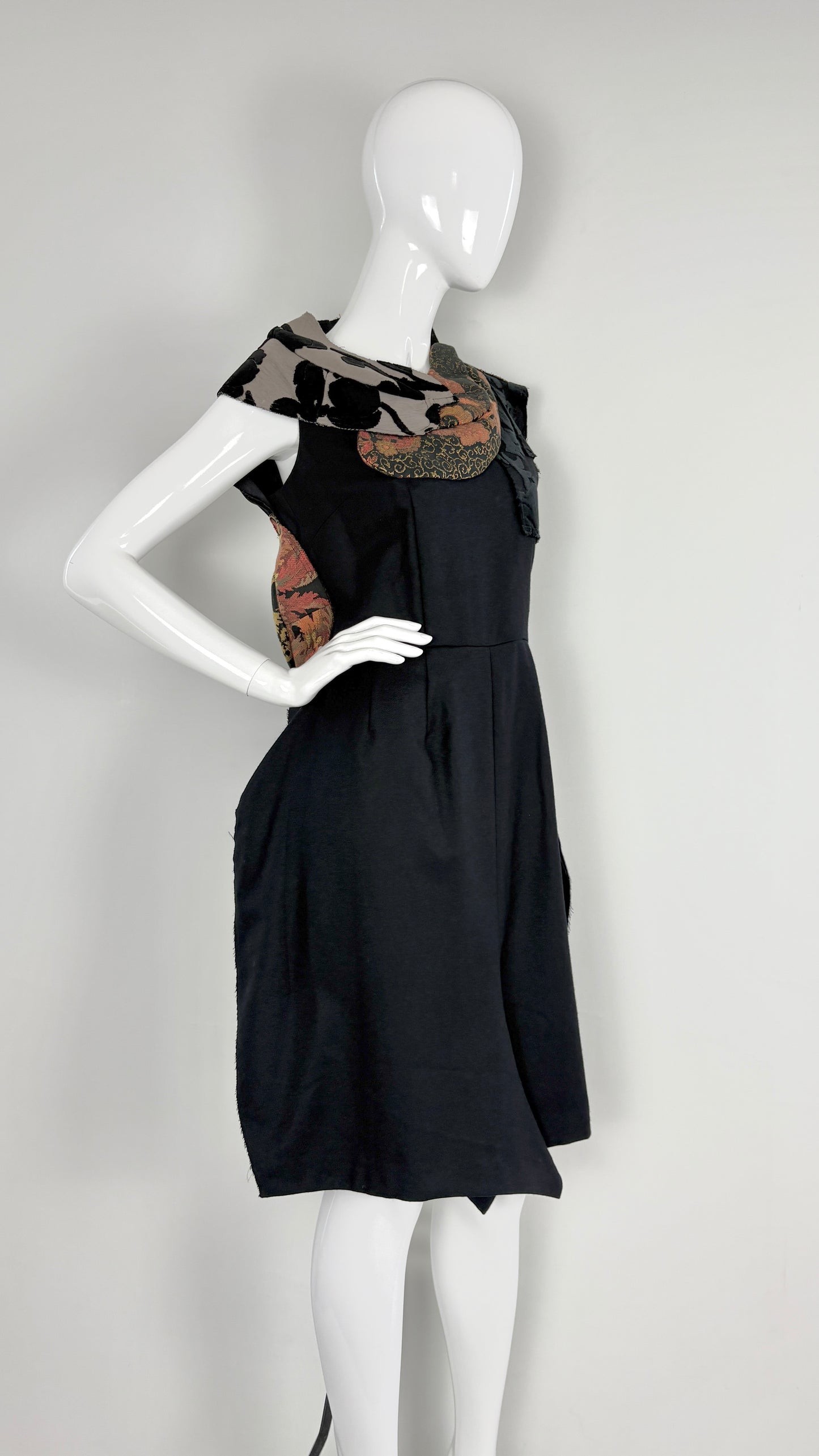 Comme des Garcons S/S 2010 structural wool dress with 3D puzzle piece back
