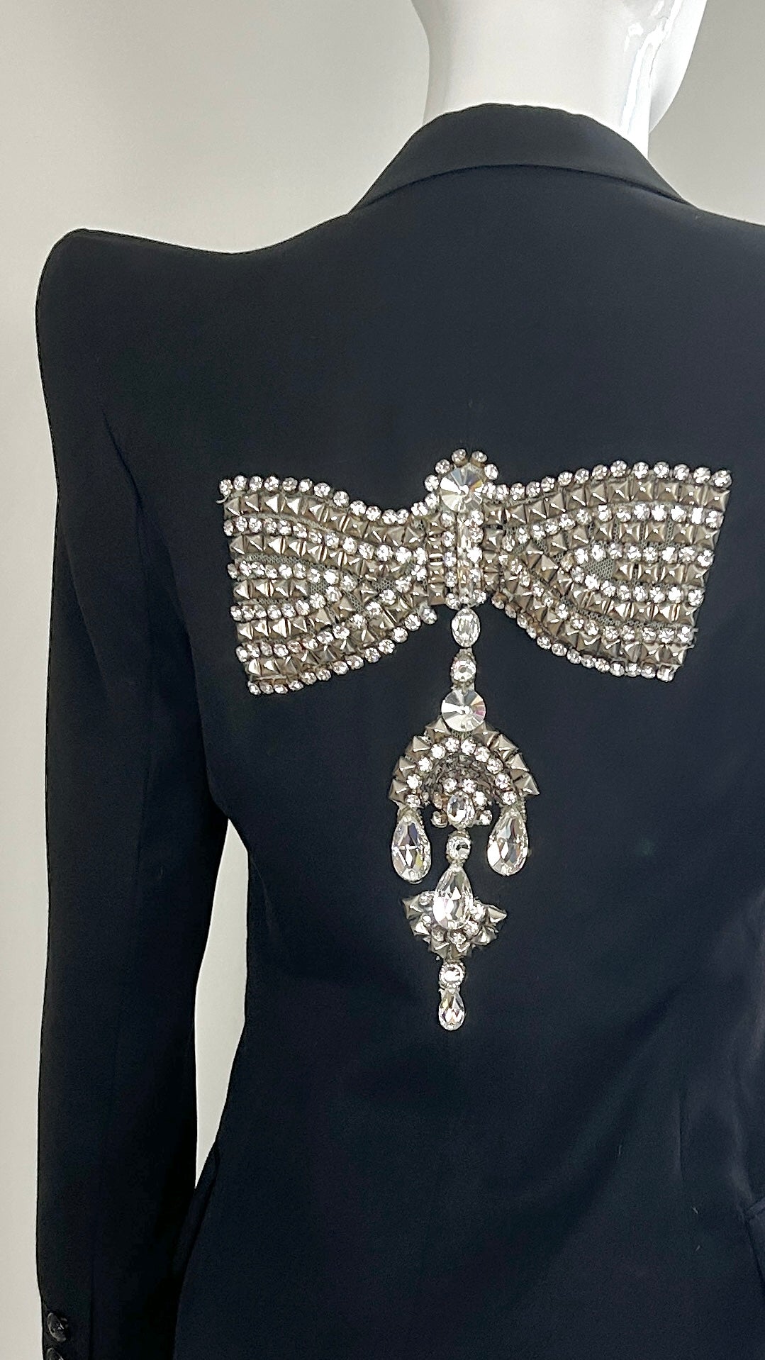 Balmain dramatic shoulder jacket with broach and embroidery