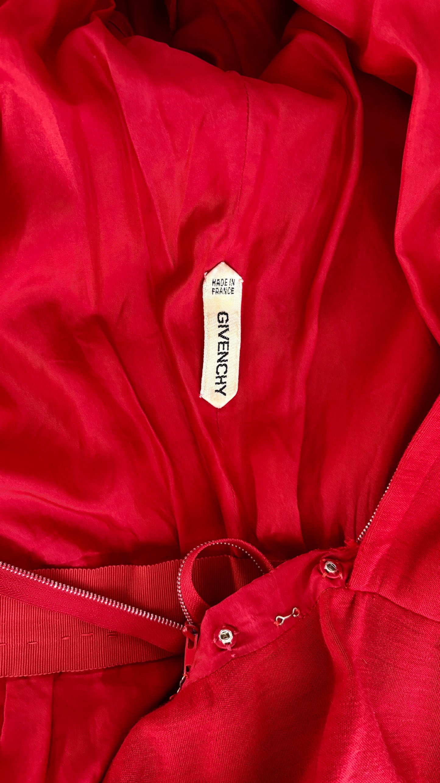 Givenchy early red tailored suit with dramatic shoulder