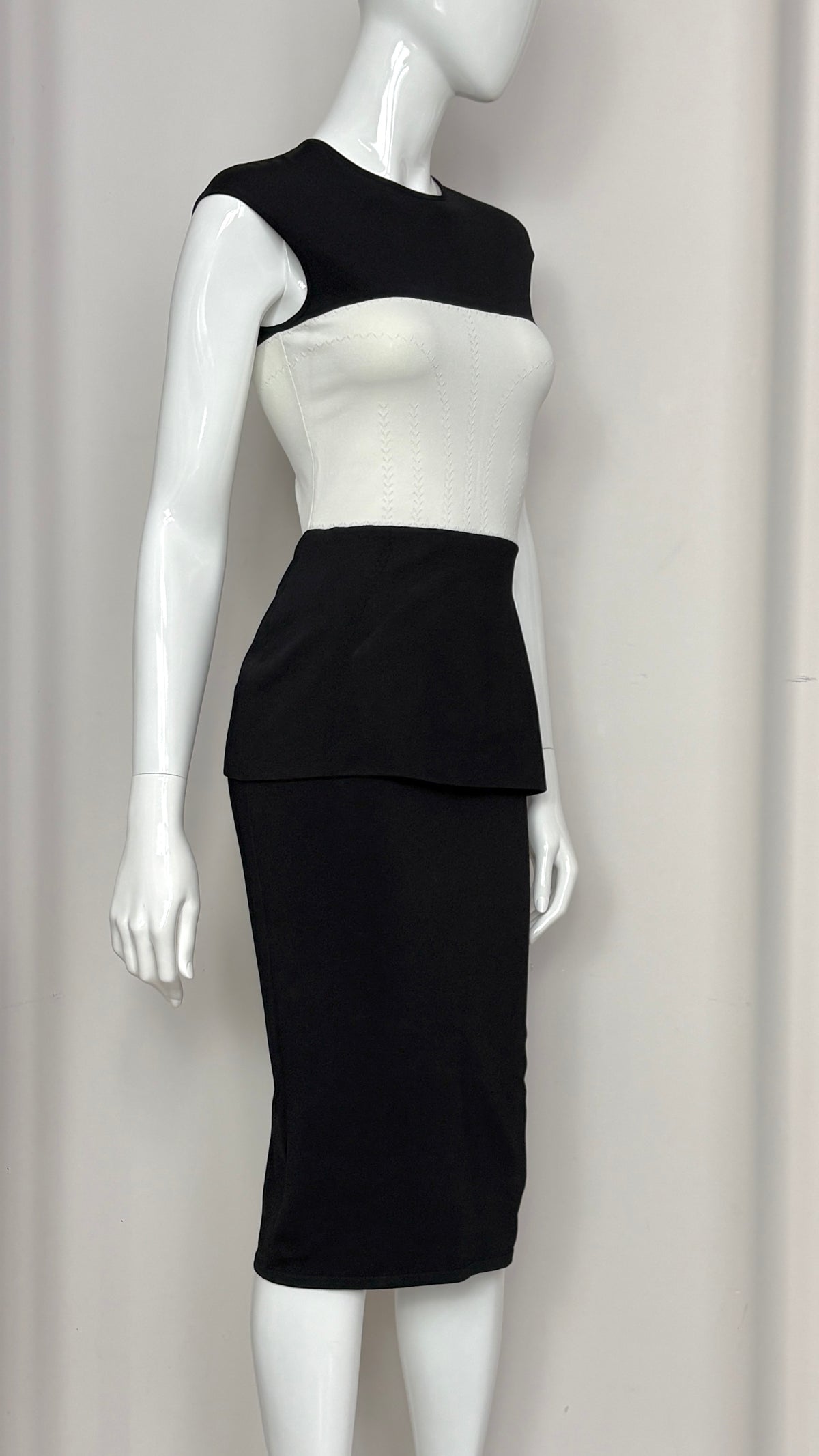 Alexander McQueen knitted peplum dress