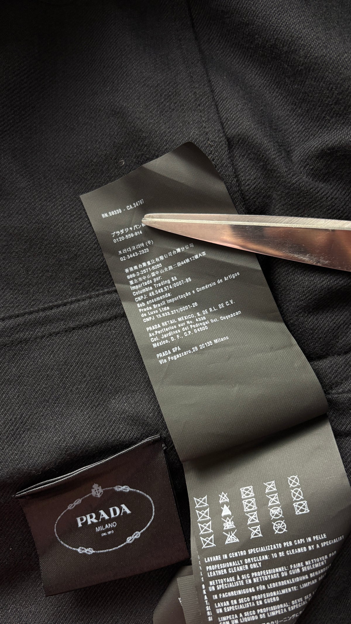 Prada S/S 2015 raw edge denim opera coat