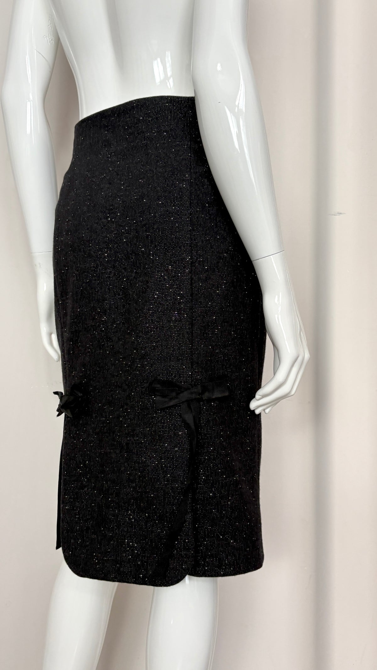 John Galliano white flecked suit with bow details