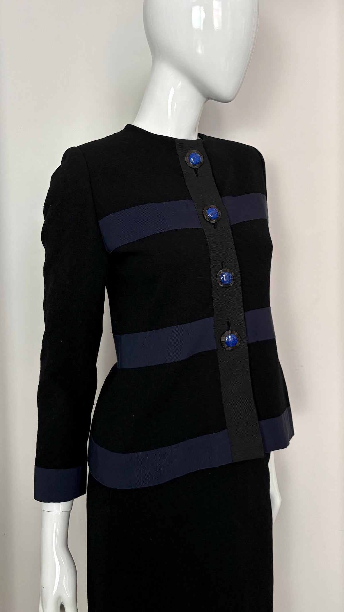 Yves Saint Laurent navy suit with contrast buttons