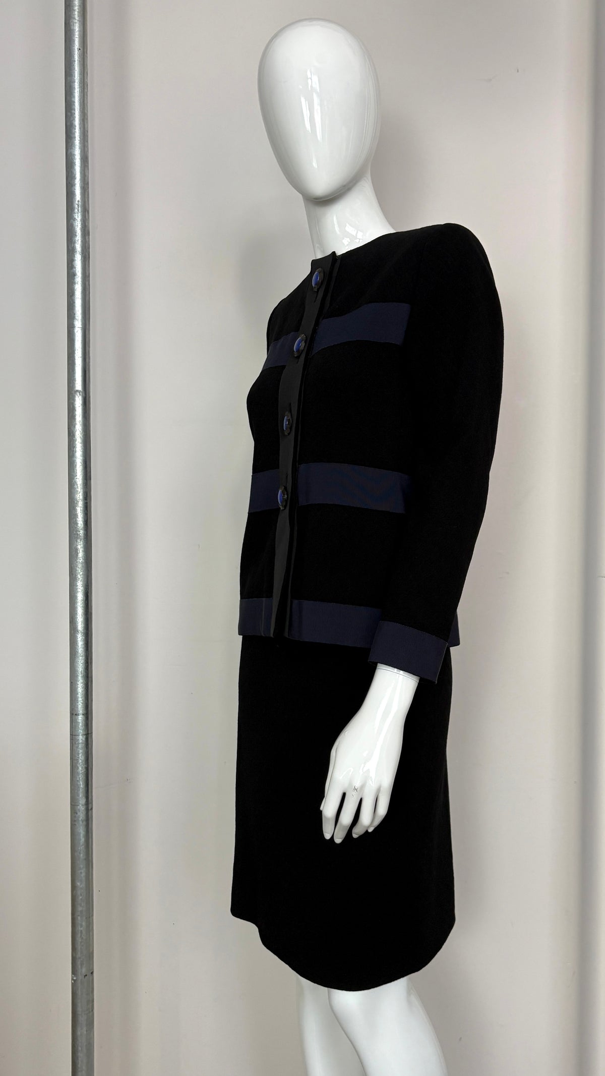 Yves Saint Laurent navy suit with contrast buttons