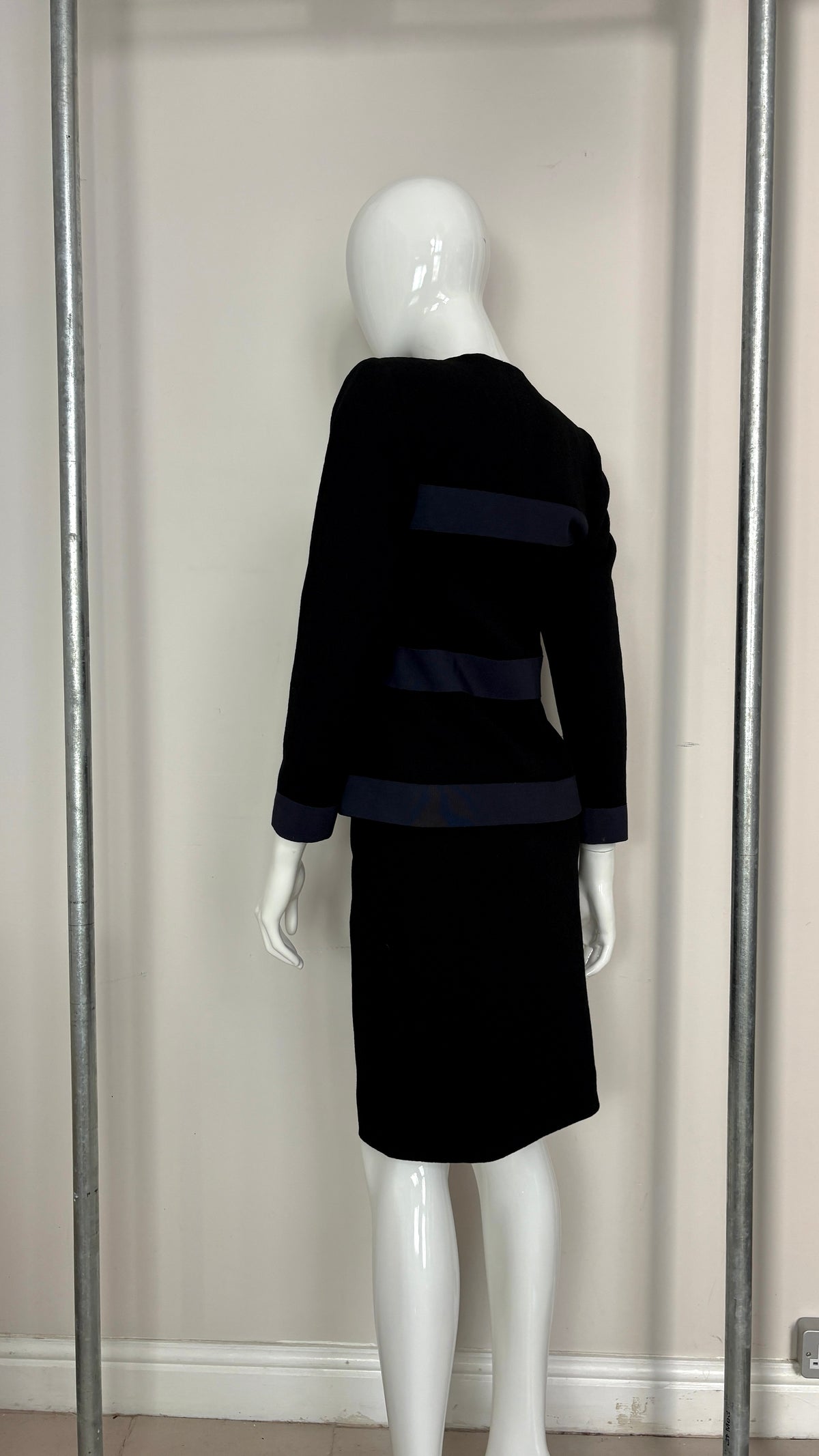 Yves Saint Laurent navy suit with contrast buttons