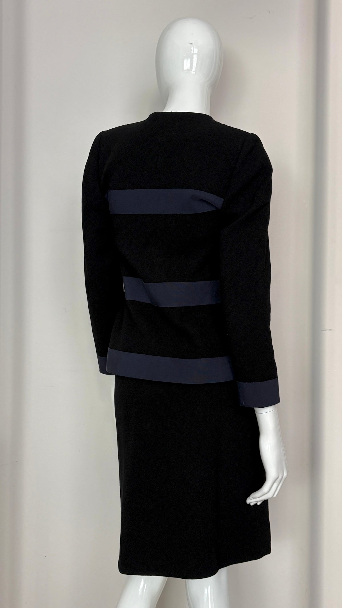 Yves Saint Laurent navy suit with contrast buttons