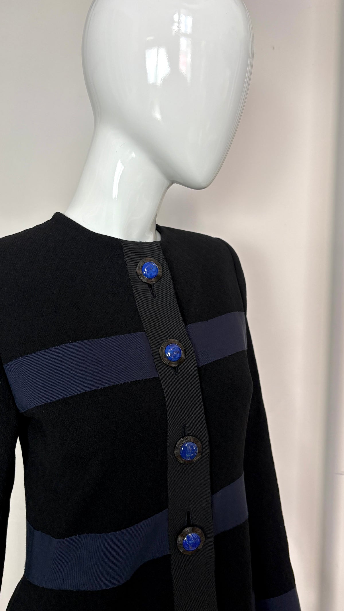 Yves Saint Laurent navy suit with contrast buttons
