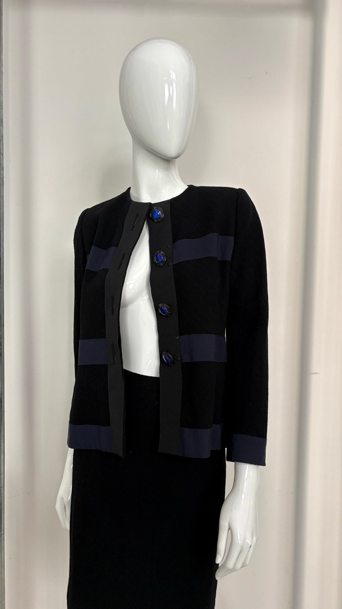 Yves Saint Laurent navy suit with contrast buttons
