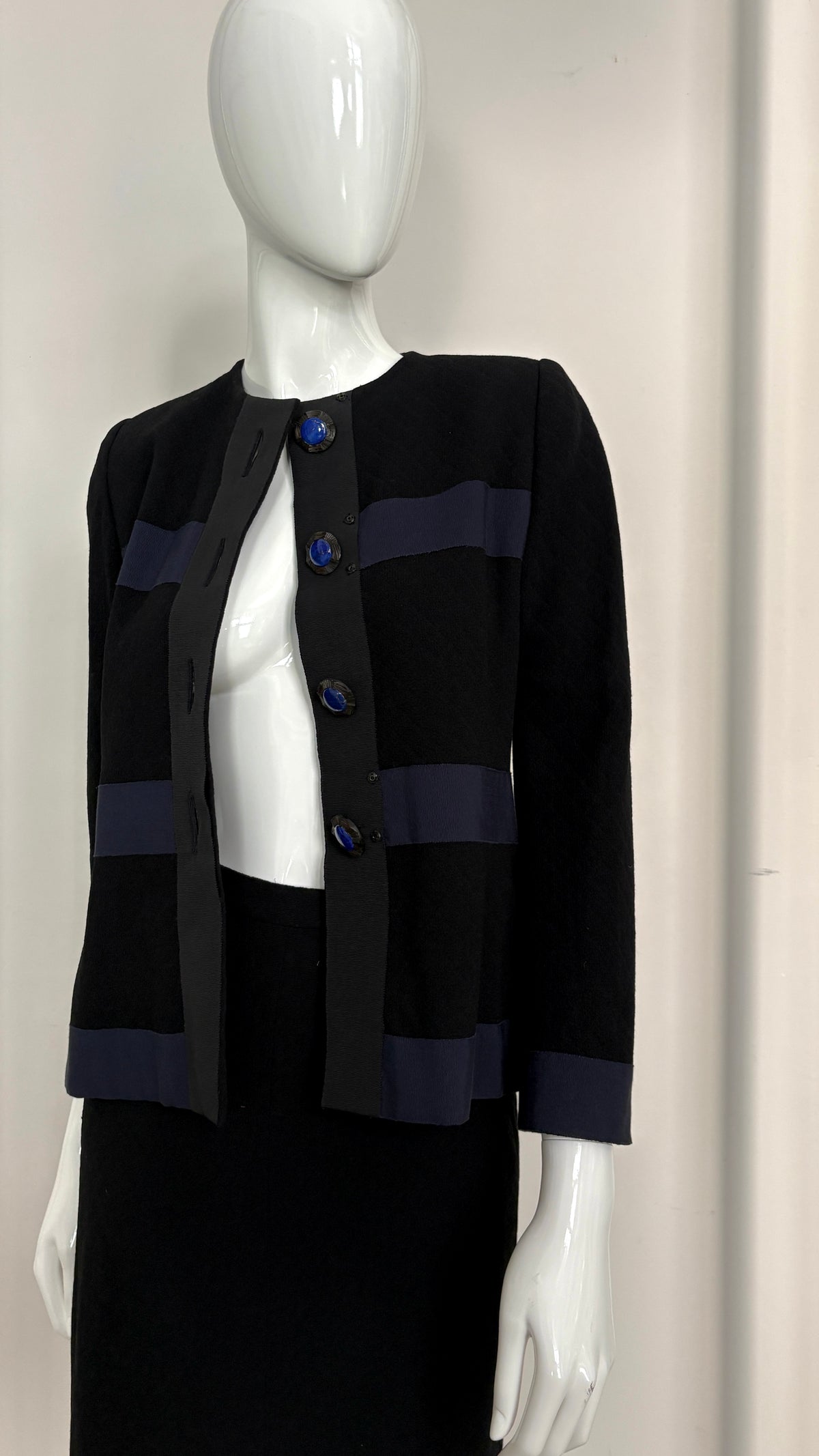 Yves Saint Laurent navy suit with contrast buttons