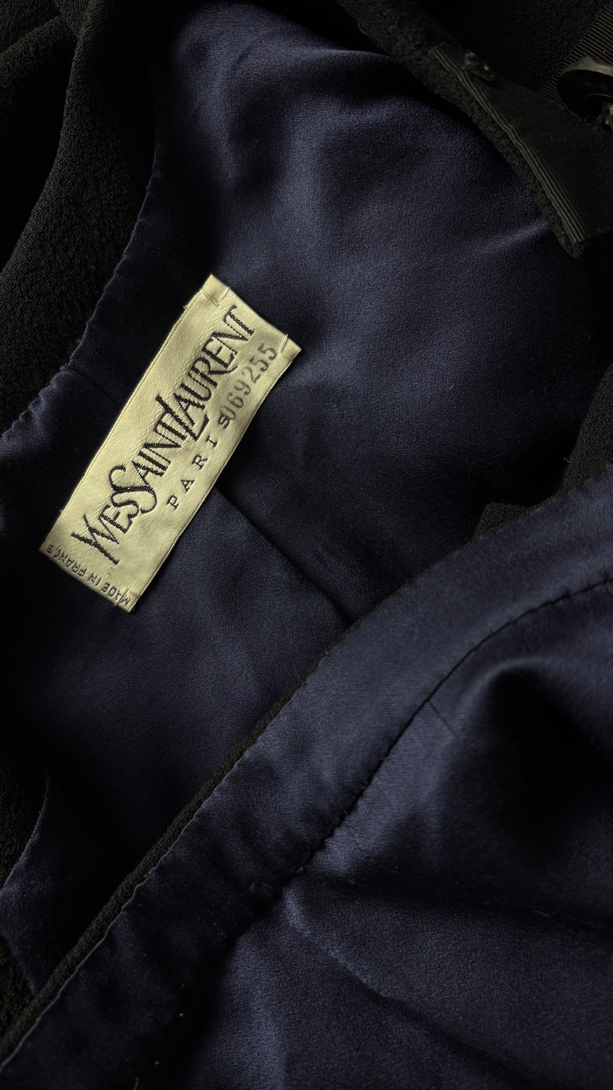 Yves Saint Laurent navy suit with contrast buttons