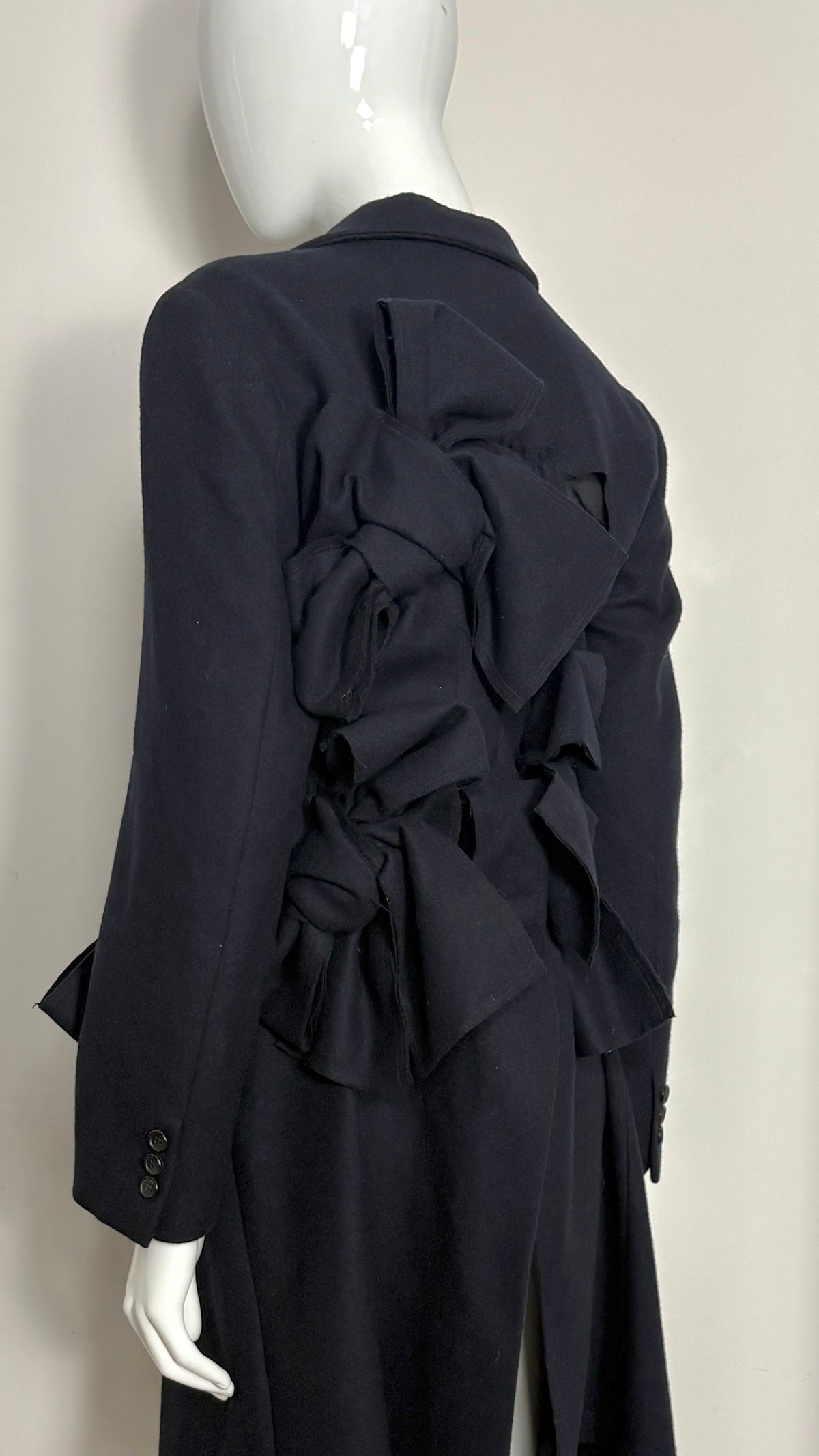 Comme des Garcons A/W 2013 raw edge integrated bow coat