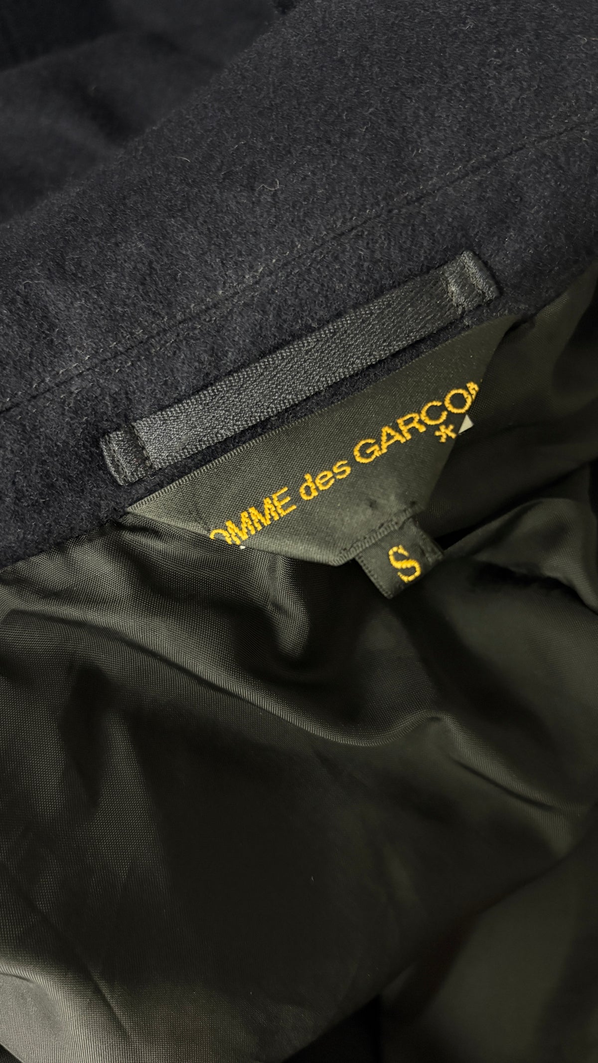 Comme des Garcons A/W 2013 raw edge integrated bow coat