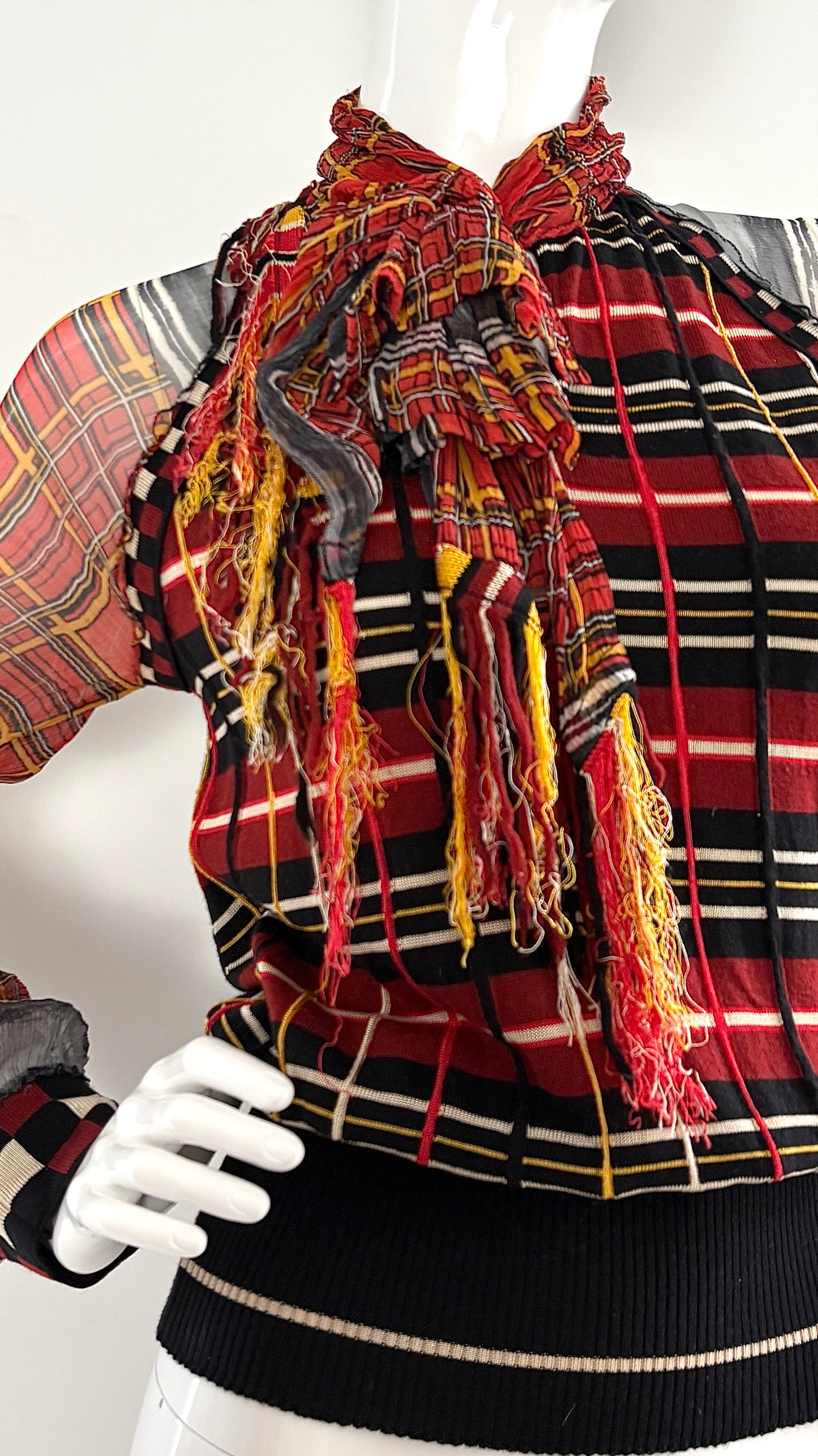 Jean Paul Gaultier tartan knit jumper with sheer sleeves and fringe scarf